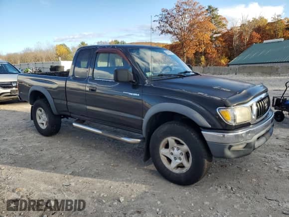 2001 Toyota Tacoma with VIN 5TEWN72N81Z873896, listed as a Copart auction lot 82741565 with 186,530 mi miles and Clean title. Bid and sale history available at DreamBid. Image 4.