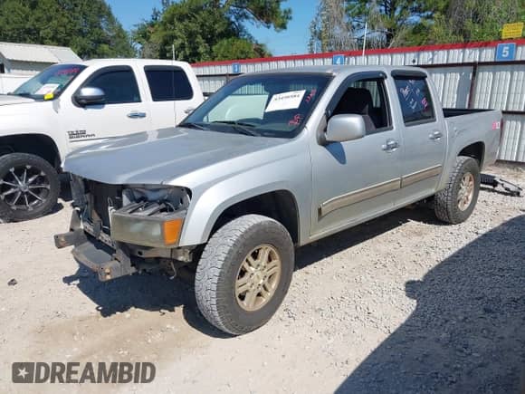 2010 Chevrolet Colorado 1LT z VIN 1GCJTCDE0A8138854, wystawiony jako IAAI lot #43450584 z przebiegiem 275 389 mil mil oraz . Historia ofert i sprzedaży dostępna na DreamBid. Obrazek 18.