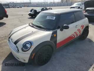 2007 MINI Hardtop with VIN WMWMF33547TT51590, listed as a Copart auction lot 57323995 with 114,113 mi miles and Salvage title. Bid and sale history available at DreamBid. Image 1.