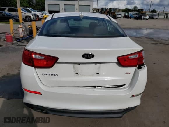 2015 Kia Optima LX с VIN KNAGM4A74F5566466, выставлен на аукционе Copart как лот 81994485 с пробегом 12 164 миль миль и Списание • Salvage title. История ставок и продаж доступна на DreamBid. Изображение 6.