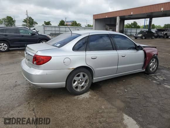 2004 Saturn L with VIN 1G8JL54R74Y512793, listed as a Copart auction lot 58732765 with 271,776 mi miles and Salvage title. Bid and sale history available at DreamBid. Image 3.