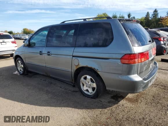 2000 Honda Odyssey EX с VIN 2HKRL1863YH012686, выставлен на аукционе Copart как лот 82359395 с пробегом 291 562 миль миль и Чистый • Clean title. История ставок и продаж доступна на DreamBid. Изображение 2.