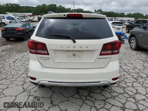 2014 Dodge Journey Crossroad z VIN 3C4PDCGG6ET289550, wystawiony jako Copart lot #66448865 z przebiegiem 193 314 mil mil oraz Szkoda całkowita • Salvage title. Historia ofert i sprzedaży dostępna na DreamBid. Obrazek 6.