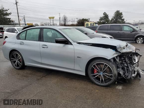 2023 BMW 3 Series 330e xDrive с VIN 3MW39FS05P8C89800, выставлен на аукционе Copart как лот 44342255 с пробегом 19 562 миль миль и Списание • Salvage title. История ставок и продаж доступна на DreamBid. Изображение 4.