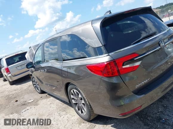 2021 Honda Odyssey EX-L with VIN 5FNRL6H75MB021064, listed as a IAAI auction lot 42975825 with 83,968 mi miles and . Bid and sale history available at DreamBid. Image 3.