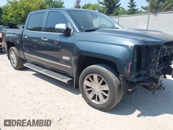 2017 Chevrolet Silverado 1500 High Country with VIN 3GCUKTEC3HG354196, listed as a IAAI auction lot 42982250 with 169,989 mi miles and . Bid and sale history available at DreamBid. Image 1.