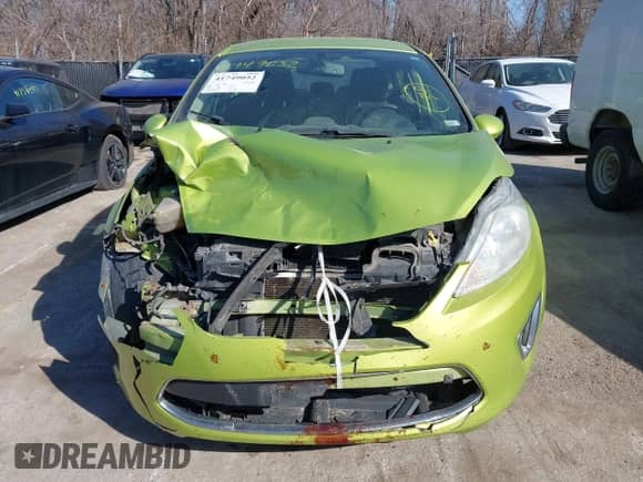 2011 Ford Fiesta SEL with VIN 3FADP4CJ0BM113915, listed as a IAAI auction lot 41749052 with 239,010 mi miles and . Bid and sale history available at DreamBid. Image 6.