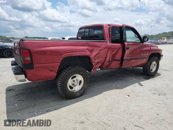 1999 Dodge 1500 with VIN 3B7HF13Y5XG211175, listed as a Copart auction lot 65951345 with 129,271 mi miles and Salvage title. Bid and sale history available at DreamBid. Image 3.