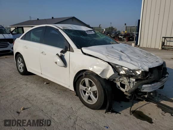 2015 Chevrolet Cruze LT with VIN 1G1PC5SB2F7107884, listed as a Copart auction lot 80141075 with 136,289 mi miles and Salvage title. Bid and sale history available at DreamBid. Image 4.