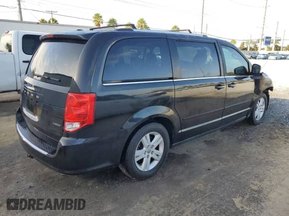2012 Dodge Grand Caravan Crew with VIN 2C4RDGDG5CR348463, listed as a Copart auction lot 85729765 with 185,415 mi miles and Salvage title. Bid and sale history available at DreamBid. Image 3.