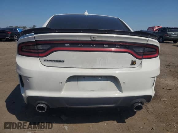 2023 Dodge Charger Scat Pack с VIN 2C3CDXGJ3PH631571, выставлен на аукционе Copart как лот 70278955 с пробегом 27 755 миль миль и Списание • Salvage title. История ставок и продаж доступна на DreamBid. Изображение 6.