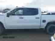2022 Chevrolet Silverado 1500 Custom Trail Boss with VIN 3GCPYCEK3NG147175, listed as a IAAI auction lot 38760584 with 9,256 mi miles and . Bid and sale history available at DreamBid. Image 14.