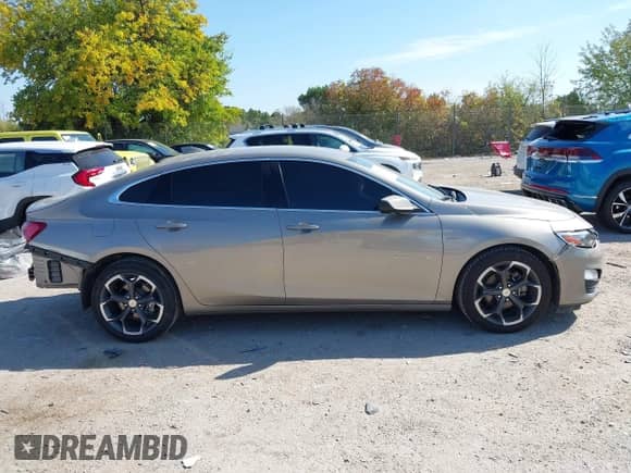 2022 Chevrolet Malibu LT z VIN 1G1ZD5ST7NF167565, wystawiony jako IAAI lot #43365428 z przebiegiem 52 285 mil mil oraz . Historia ofert i sprzedaży dostępna na DreamBid. Obrazek 13.