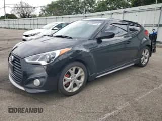 2014 Hyundai Veloster Turbo R-Spec с VIN KMHTC6AE9EU209637, выставлен на аукционе Copart как лот 67860545 с пробегом 112 479 миль миль и Списание • Salvage title. История ставок и продаж доступна на DreamBid. Изображение 1.