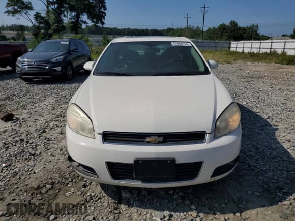 2006 Chevrolet Impala LT 3.9L with VIN 2G1WC581569345852, listed as a Copart auction lot 62908705 with 127,361 mi miles and Salvage title. Bid and sale history available at DreamBid. Image 5.