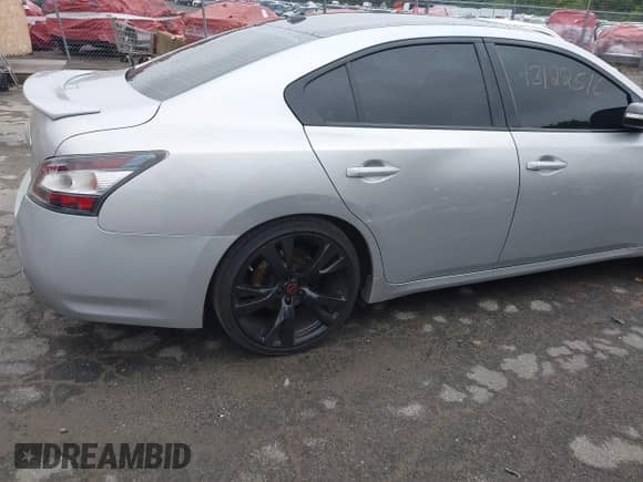 2014 Nissan Maxima S z VIN 1N4AA5AP3EC495087, wystawiony jako IAAI lot #43122516 z przebiegiem 122 886 mil mil oraz . Historia ofert i sprzedaży dostępna na DreamBid. Obrazek 18.