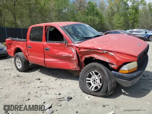 2003 Dodge Dakota Sport with VIN 1D7HG38X23S288703, listed as a Copart auction lot 53920575 with 260,506 mi miles and Salvage title. Bid and sale history available at DreamBid. Image 4.