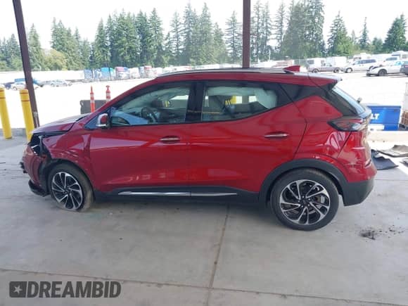 2022 Chevrolet Bolt EUV Premier z VIN 1G1FZ6S00N4117733, wystawiony jako IAAI lot #42504454 z przebiegiem 74 647 mil mil oraz . Historia ofert i sprzedaży dostępna na DreamBid. Obrazek 14.