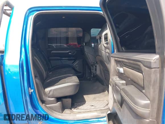 2022 Ram 1500 TRX with VIN 1C6SRFU96NN267610, listed as a IAAI auction lot 43033854 with 19,475 mi miles and . Bid and sale history available at DreamBid. Image 8.