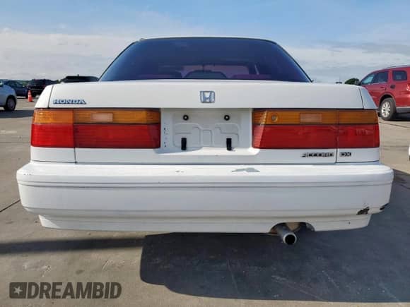 1991 Honda Accord с VIN 1HGCB7647MA136590, выставлен на аукционе Copart как лот 58500425 с пробегом 149 771 миль миль и Списание • Salvage title. История ставок и продаж доступна на DreamBid. Изображение 6.