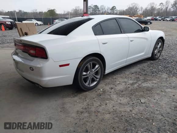 2013 Dodge Charger SXT with VIN 2C3CDXJG8DH528767, listed as a IAAI auction lot 41627596 with 204,619 mi miles and . Bid and sale history available at DreamBid. Image 4.