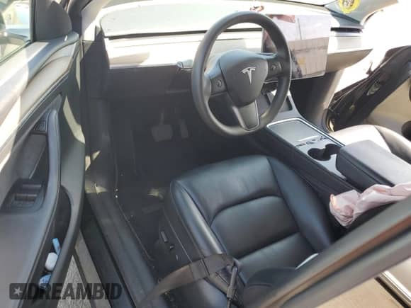 2023 Tesla Model Y Long Range с VIN 7SAYGAEE3PF903721, выставлен на аукционе Copart как лот 68774815 с пробегом Не указан миль и Списание • Salvage title. История ставок и продаж доступна на DreamBid. Изображение 8.