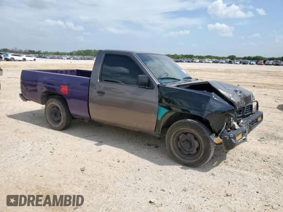 1996 Nissan Frontier XE with VIN 1N6SD11S2TC337322, listed as a Copart auction lot 59141775 with 174,109 mi miles and Salvage title. Bid and sale history available at DreamBid. Image 4.