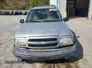 2002 Chevrolet Tracker with VIN 2CNBJ13C726912437, listed as a Copart auction lot 68384355 with 128,170 mi miles and Salvage title. Bid and sale history available at DreamBid. Image 5.