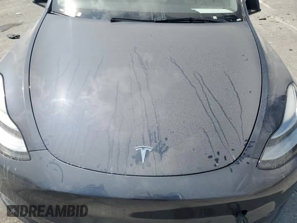 2022 Tesla Model Y Long Range with VIN 7SAYGDEEXNF480795, listed as a Copart auction lot 65829584 with Not provided miles and Salvage title. Bid and sale history available at DreamBid. Image 12.
