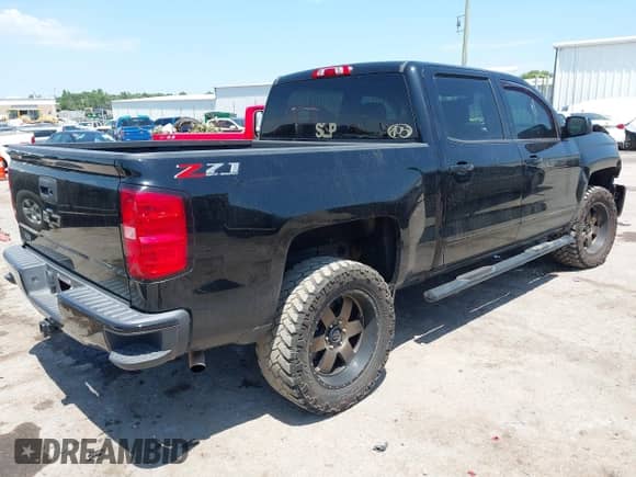 2018 Chevrolet Silverado 1500 LT с VIN 3GCUKRECXJG633959, выставлен на аукционе IAAI как лот 42838531 с пробегом 63 412 миль миль и . История ставок и продаж доступна на DreamBid. Изображение 4.