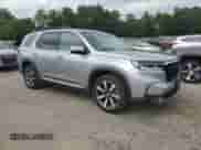 2023 Honda Pilot Touring z VIN 5FNYG1H78PB012799, wystawiony jako Copart lot #64933945 z przebiegiem 31 834 mil mil oraz Szkoda całkowita • Salvage title. Historia ofert i sprzedaży dostępna na DreamBid. Obrazek 4.