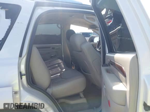 2003 Cadillac Escalade z VIN 1GYEK63N13R134181, wystawiony jako IAAI lot #43138639 z przebiegiem 101 321 mil mil oraz . Historia ofert i sprzedaży dostępna na DreamBid. Obrazek 8.