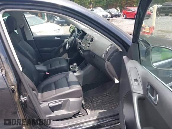 2011 Volkswagen Tiguan S with VIN WVGAV7AX2BW549477, listed as a IAAI auction lot 42923494 with 96,348 mi miles and . Bid and sale history available at DreamBid. Image 5.