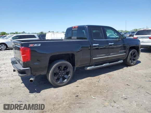 2017 Chevrolet Silverado 1500 LTZ with VIN 1GCVKSEC5HZ149848, listed as a Copart auction lot 54541825 with 104,291 mi miles and Salvage title. Bid and sale history available at DreamBid. Image 3.