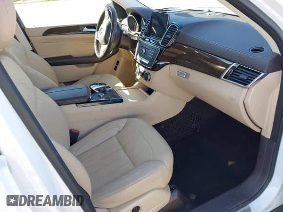 2018 Mercedes-Benz GLS 450 with VIN 4JGDF6EEXJB153297, listed as a IAAI auction lot 41217775 with 119,716 mi miles and . Bid and sale history available at DreamBid. Image 5.