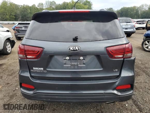 2019 Kia Sorento LX с VIN 5XYPGDA59KG609497, выставлен на аукционе Copart как лот 80642145 с пробегом 49 304 миль миль и Списание • Salvage title. История ставок и продаж доступна на DreamBid. Изображение 6.