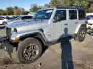2023 Jeep Wrangler Sahara Altitude with VIN 1C4HJXEG1PW601584, listed as a Copart auction lot 84018874 with 12,003 mi miles and Salvage title. Bid and sale history available at DreamBid. Image 1.