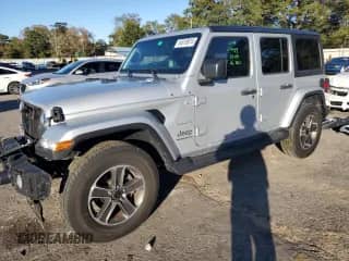 2023 Jeep Wrangler Sahara Altitude with VIN 1C4HJXEG1PW601584, listed as a Copart auction lot 84018874 with 12,003 mi miles and Salvage title. Bid and sale history available at DreamBid. Image 1.