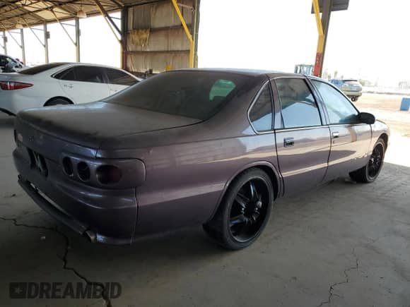 1996 Chevrolet Caprice 1SA Special Value с VIN 1G1BL52P0TR167474, выставлен на аукционе Copart как лот 61995575 с пробегом Не указан миль и Чистый • Clean title. История ставок и продаж доступна на DreamBid. Изображение 3.