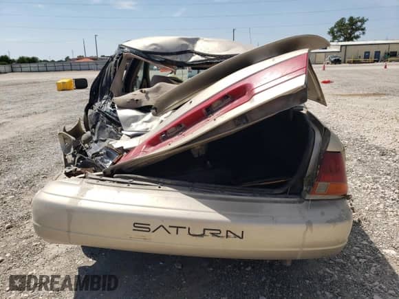 1998 Saturn SL с VIN 1G8ZK5271WZ265579, выставлен на аукционе Copart как лот 68153934 с пробегом Не указан миль и Списание • Salvage title. История ставок и продаж доступна на DreamBid. Изображение 6.