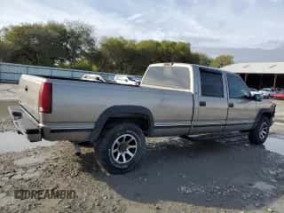 2000 Chevrolet Silverado 3500 с VIN 1GCGC33R3YF516072, выставлен на аукционе Copart как лот 83587024 с пробегом 77 586 миль миль и Списание • Salvage title. История ставок и продаж доступна на DreamBid. Изображение 3.
