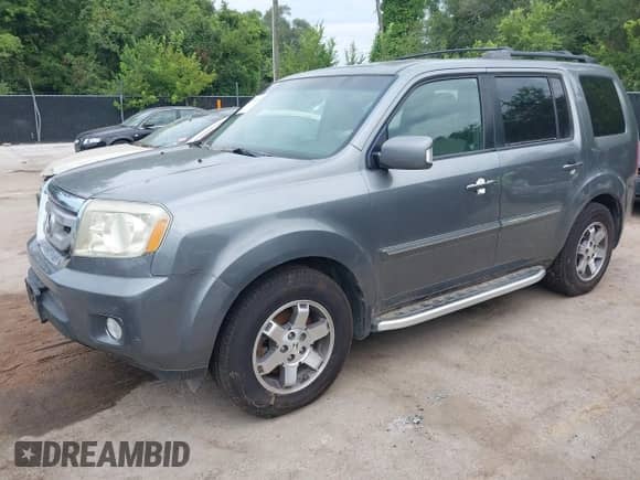 2009 Honda Pilot Touring with VIN 5FNYF48969B031280, listed as a IAAI auction lot 42934690 with 163,844 mi miles and . Bid and sale history available at DreamBid. Image 2.