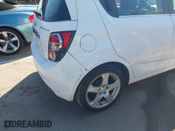 2013 Chevrolet Sonic LTZ with VIN 1G1JE6SH1D4196761, listed as a IAAI auction lot 42746967 with 158,863 mi miles and . Bid and sale history available at DreamBid. Image 6.