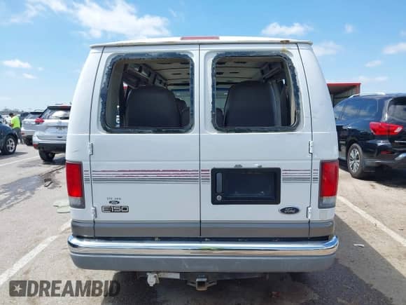 1999 Ford Econoline Cargo Recreational with VIN 1FDRE14L2XHA41059, listed as a IAAI auction lot 42067879 with 149,185 mi miles and . Bid and sale history available at DreamBid. Image 16.