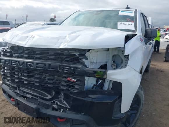 2022 Chevrolet Silverado 1500 Custom Trail Boss with VIN 3GCPYCEK3NG147175, listed as a IAAI auction lot 38760584 with 9,256 mi miles and . Bid and sale history available at DreamBid. Image 6.