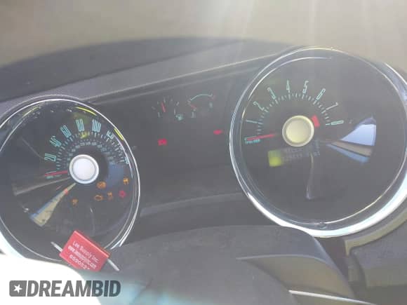 2012 Ford Mustang Premium with VIN 1ZVBP8AM4C5261141, listed as a IAAI auction lot 43217325 with 129,419 mi miles and . Bid and sale history available at DreamBid. Image 7.