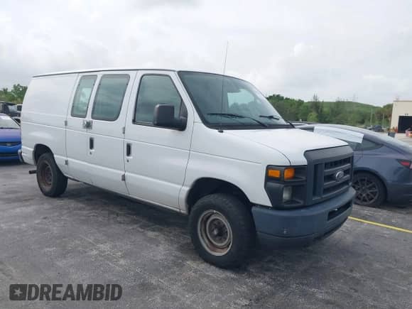 2013 Ford Econoline Cargo Commercial with VIN 1FTNE1EW1DDA90039, listed as a IAAI auction lot 42439049 with 218,937 mi miles and . Bid and sale history available at DreamBid. Image 1.