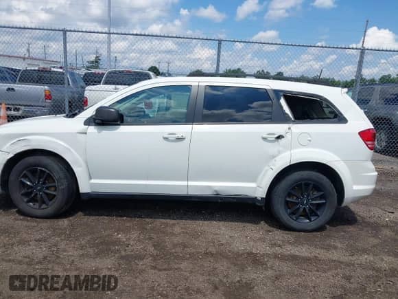 2020 Dodge Journey SE Value with VIN 3C4PDCAB7LT260441, listed as a IAAI auction lot 42917125 with 71,791 mi miles and . Bid and sale history available at DreamBid. Image 14.