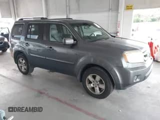 2011 Honda Pilot EX-L z VIN 5FNYF3H66BB056069, wystawiony jako IAAI lot #43030240 z przebiegiem 141 786 mil mil oraz . Historia ofert i sprzedaży dostępna na DreamBid. Obrazek 1.