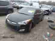 2014 Hyundai Veloster with VIN KMHTC6AD6EU182596, listed as a IAAI auction lot 41498382 with 99,376 mi miles and . Bid and sale history available at DreamBid. Image 2.